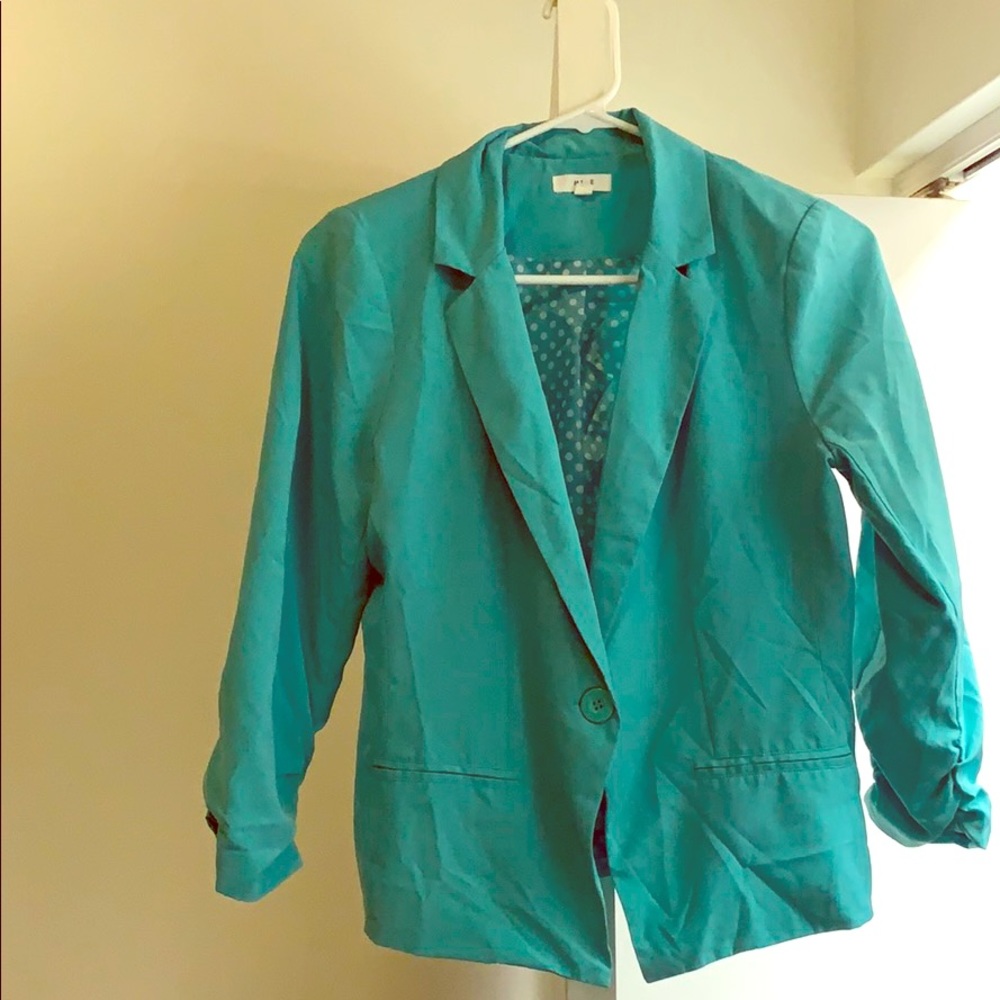 A teal/sea foam blazer